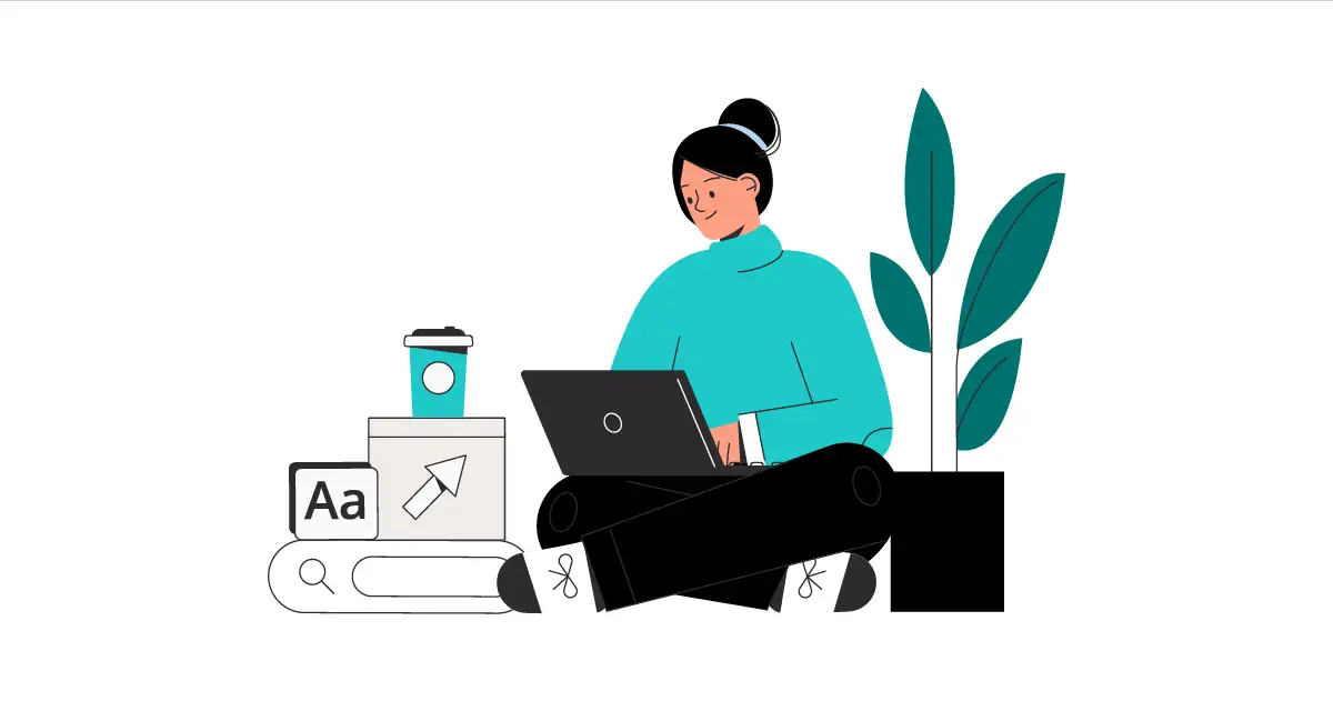 Person sitting cross-legged with a laptop, surrounded by books, a coffee cup, and a plant at the side.