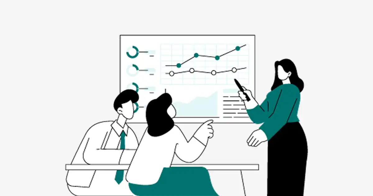 People in a meeting presenting data on a large screen with line and bar charts in teal and black.